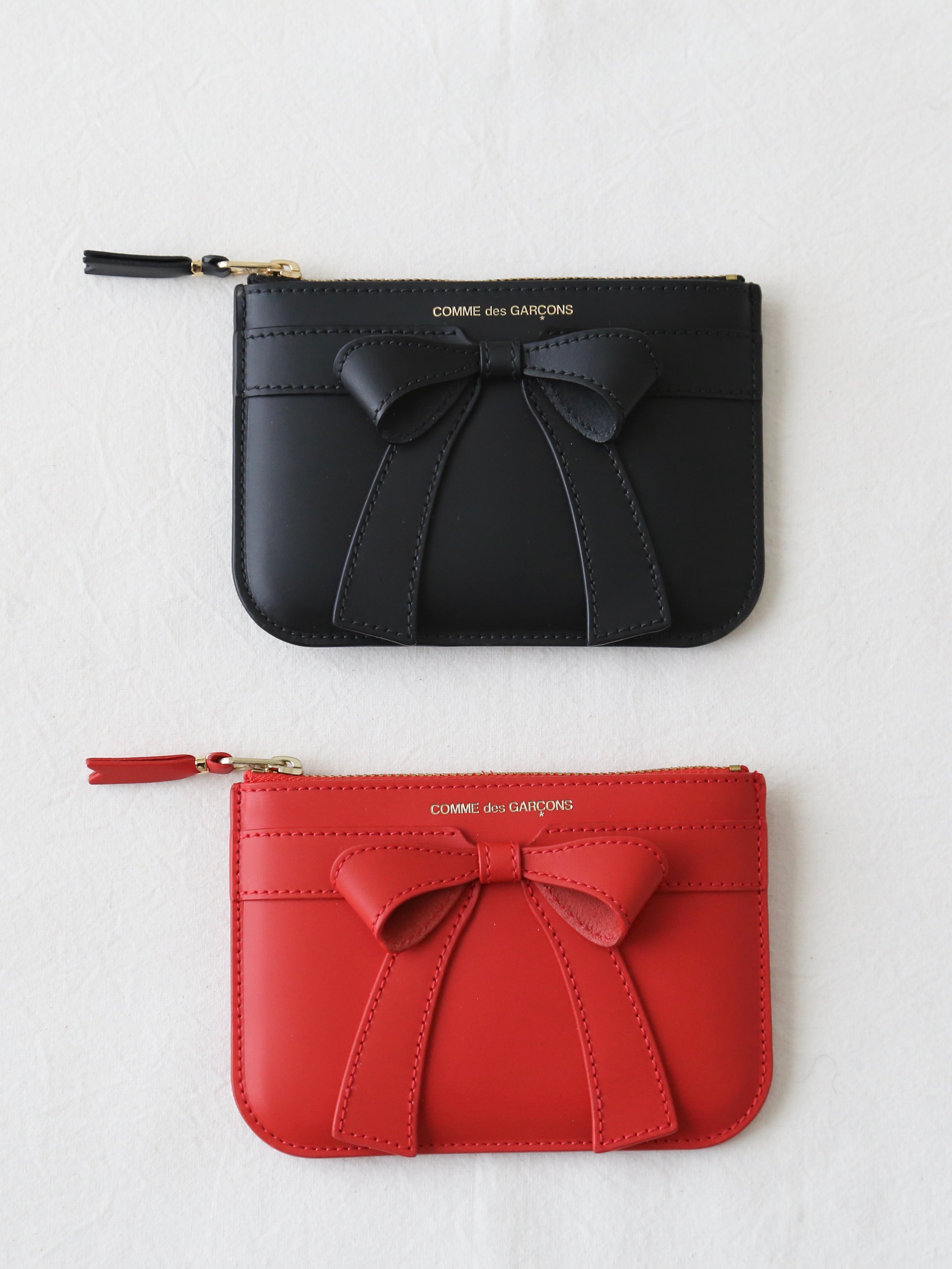 Wallet COMME des GARCONS ビッグボウ(ポーチ・S) [8Z-O810-051] – CREER