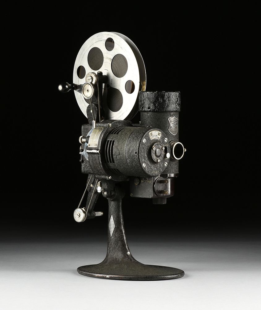 AN AMERICAN BELL & HOWELL FILMO 16MM AUTOMATIC CINE PROJECTOR