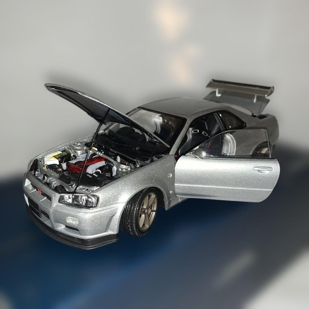 エブロ　日産スカイラインGT-R（R 34）VスペックⅡ 1/24 シルバー 1/24 ニッサン スカイラインGT-R R34 VスペックII(シルバー)【24017